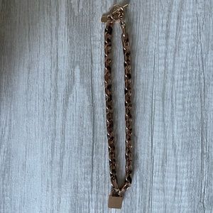 Michael Kors rose gold/brown lock necklace. NEW.